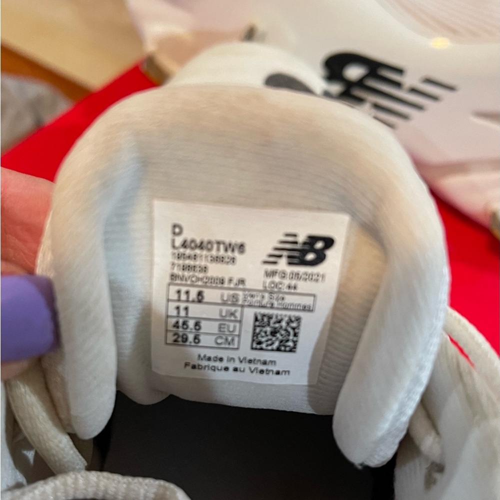 New Balance Baseball cleats.